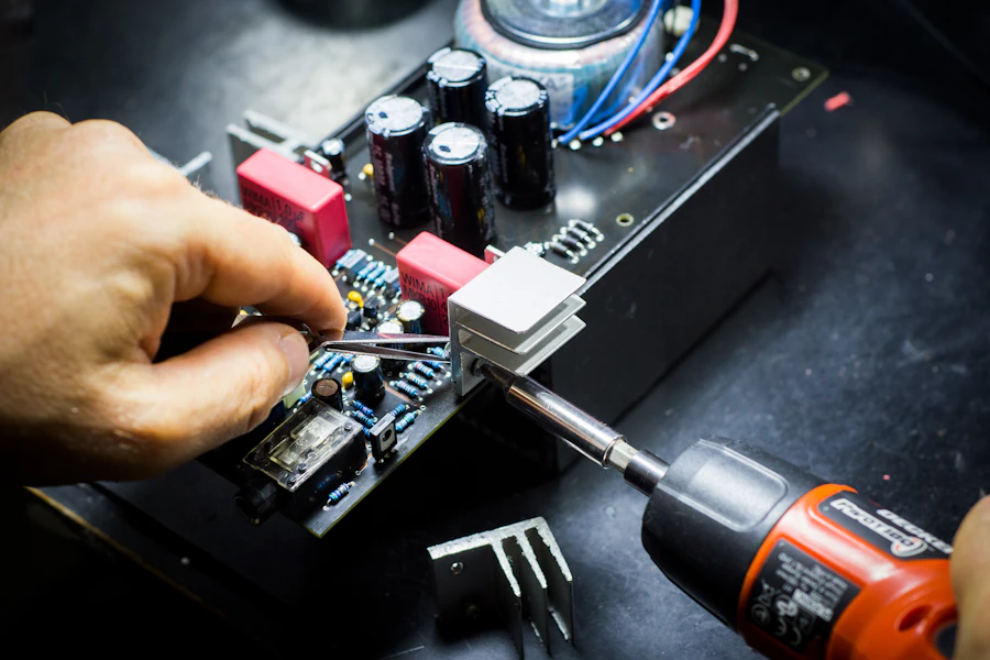 Technician repairing a hardware component